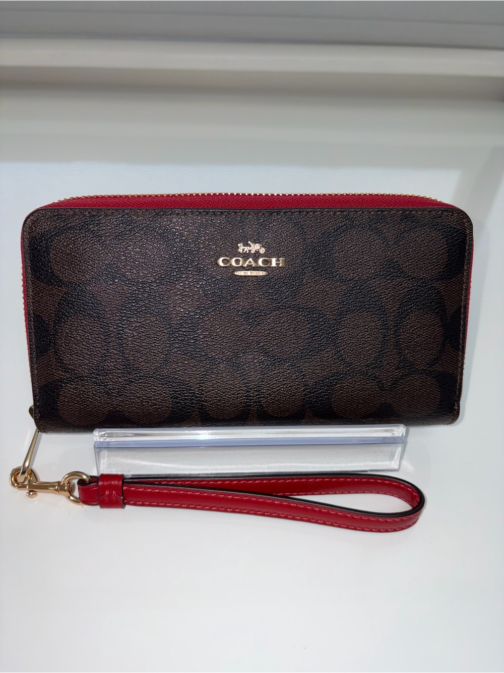 Coach Brown Monogram Long Zip Wallet with Red Wrist Strap